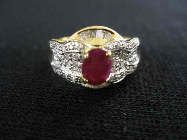 Appraisal: Ruby Diamond Ring oval gem weighing carat with round baguette