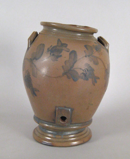 Appraisal: Stoneware water cooler th c with cobalt floral decoration h