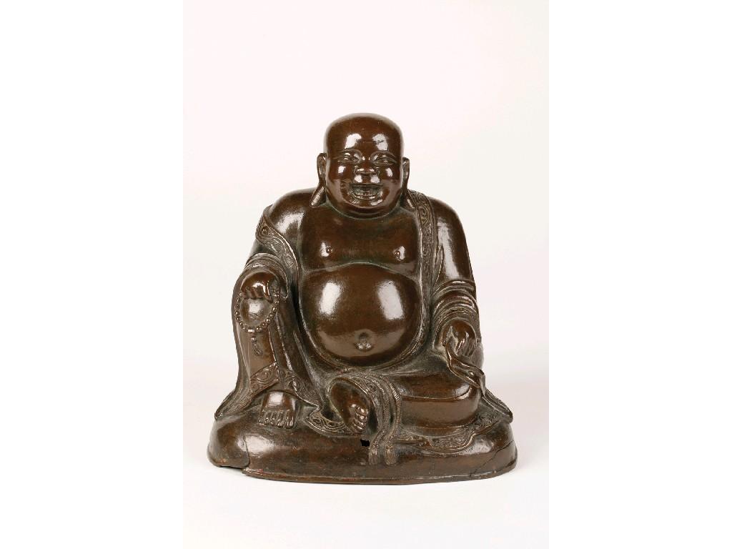 Appraisal: A CHINESE BRONZE FIGURE OF BUDAI seated and wearing robes