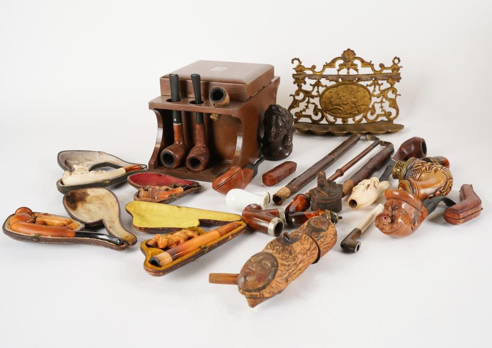 Appraisal: COLLECTION OF PIPES AND PIPE STANDScomprising a gilt metal stand