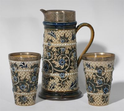 Appraisal: A Doulton Lambeth stoneware jug and two beakers by George