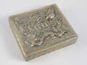 Appraisal: A Chinese silver box the lid heavily embossed with a