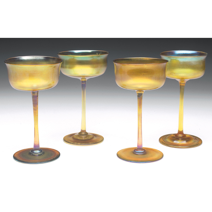 Appraisal: L C Tiffany wine glasses four gold favrile glass with