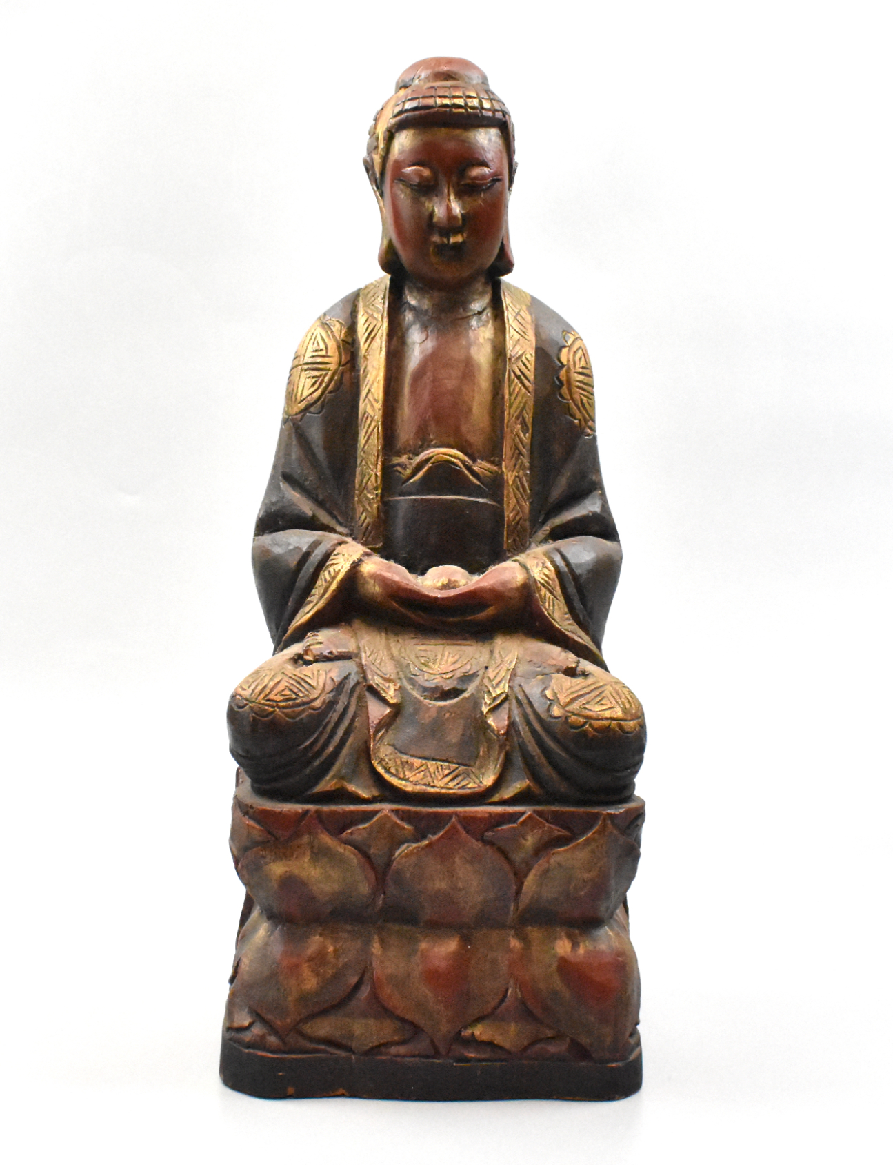 Appraisal: A Chinese wood seated figurine Figure seated in lotus position