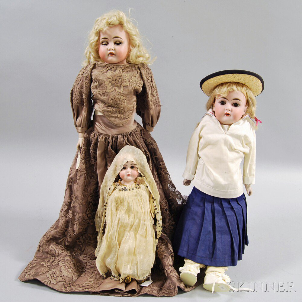 Appraisal: Three German Bisque Head Girl Dolls early th century Estimate