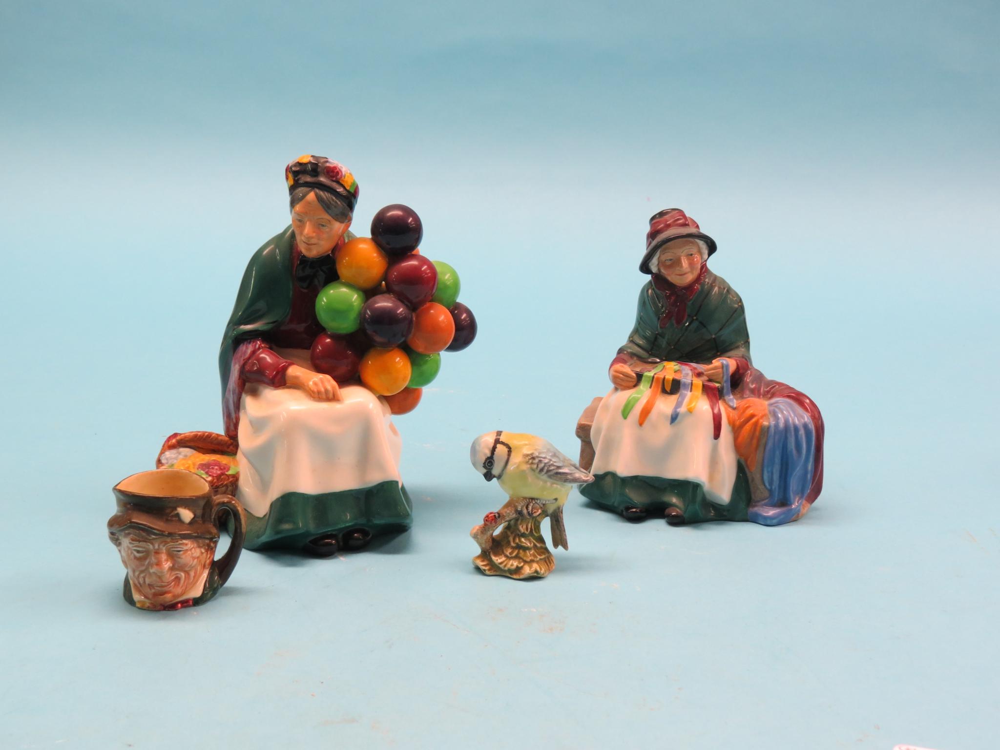 Appraisal: Two Royal Doulton figures The Old Balloon Seller HN Silks