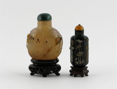 Appraisal: Two Chinese snuff bottles one chalcedony carved with a man