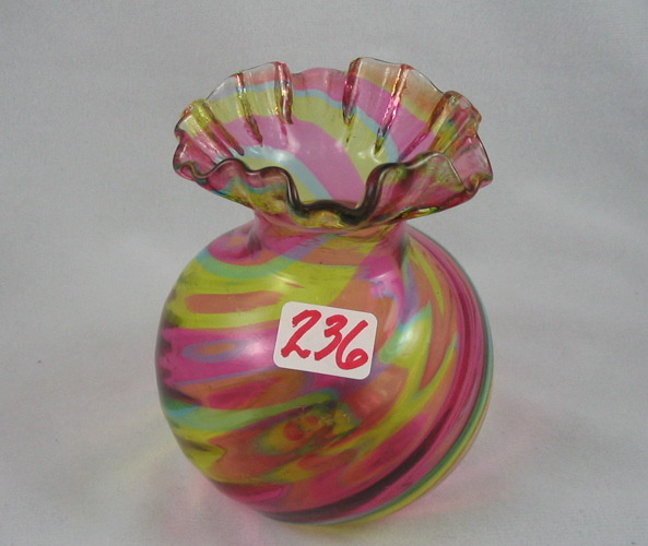 Appraisal: A RAINBOW SWIRL ART GLASS VASE in bulbous form having