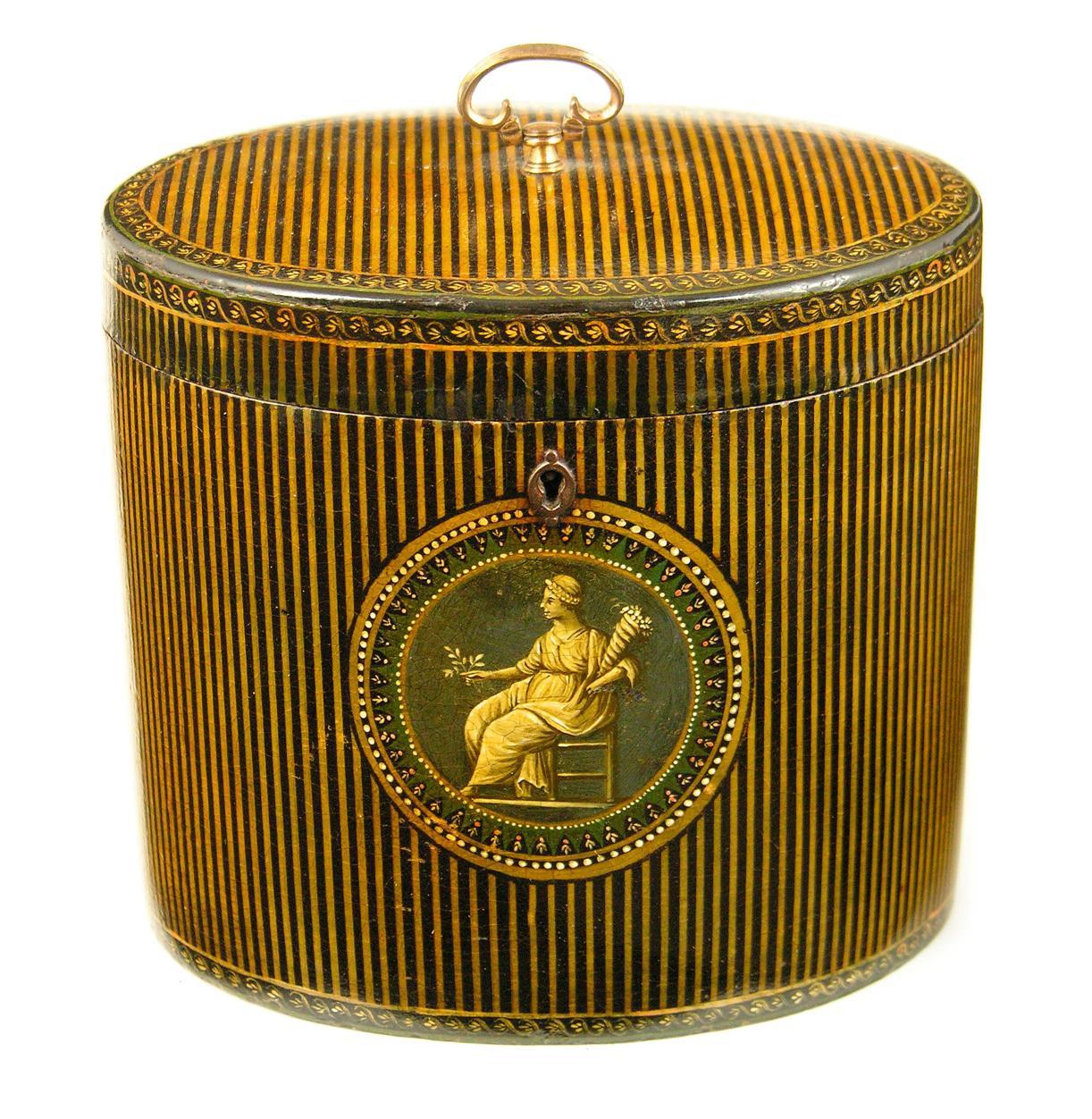 Appraisal: A George III papier-mache oval tea caddy in the manner