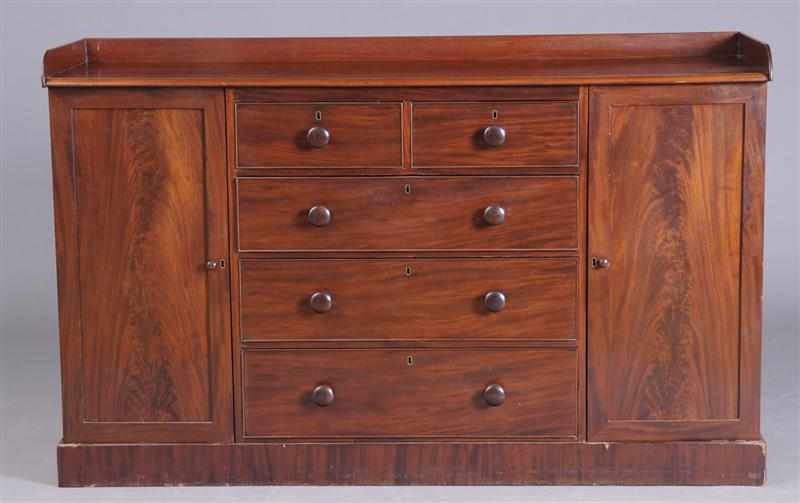 Appraisal: GEORGE IV DRESSING CABINET The three-quarter galleried top above two