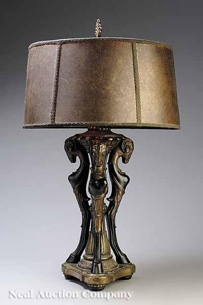 Appraisal: A Bronze and Black-Patinated Table Lamp with a Mica Shade