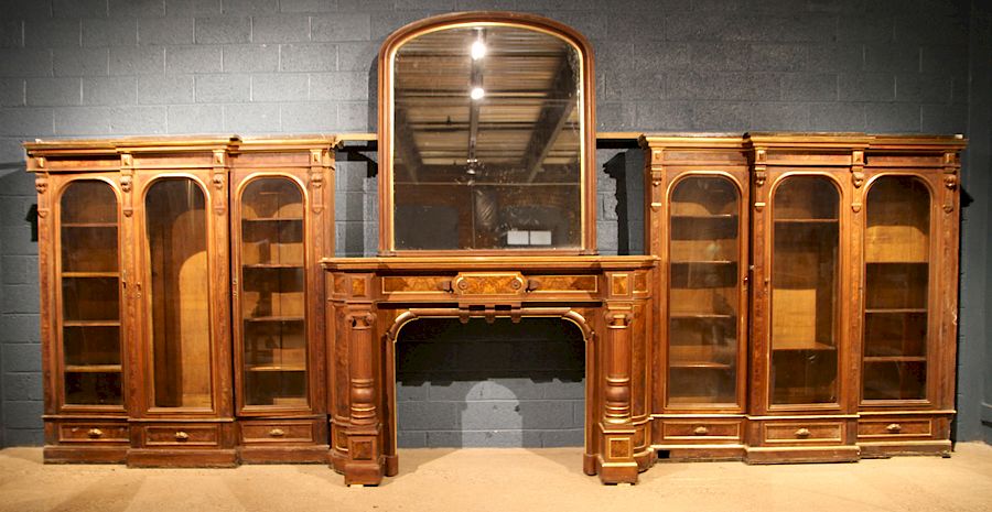 Appraisal: A TH C MONUMENTAL BURLED WALNUT MANTLE A nineteenth century