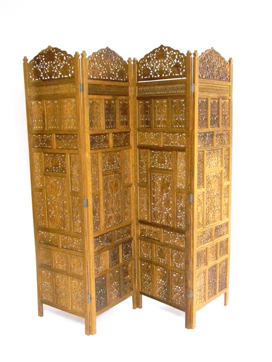 Appraisal: Four-panel Indian floor screen pierced and carved wooden panels ''