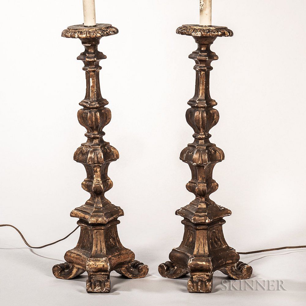 Appraisal: Pair of Carved Giltwood Candlesticks Pair of Carved Giltwood Candlesticks