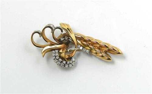 Appraisal: GOLD AND DIAMOND CLIP ca Yellow gold Decorative clip in