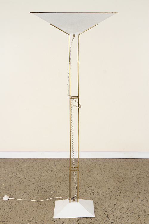 Appraisal: BRASS FLOOR LAMP PERFORATED PYRAMID SHADE C A brass floor