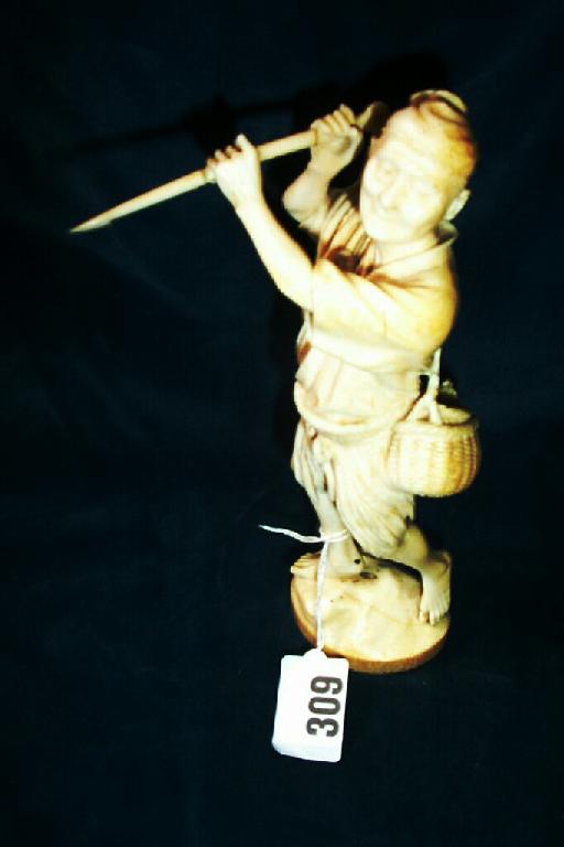 Appraisal: A th century Japanese carved ivory figure of a fisherman