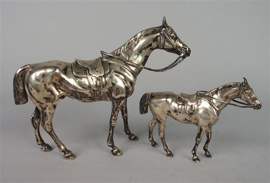 Appraisal: TWO CONTINENTAL SILVER FIGURES OF HORSES length inches weight approximately