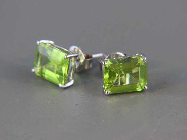 Appraisal: Peridot Earrings vivid green emerald cut gems totaling carats in