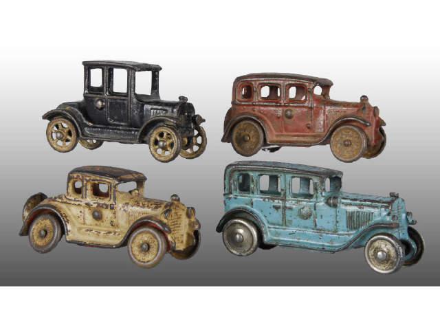 Appraisal: Lot of Cast Iron Automobile Toys Description Champion blue sedan