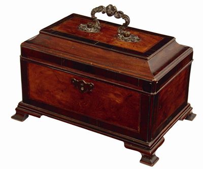 Appraisal: A George II mahogany tea caddy with palmwood cross banding