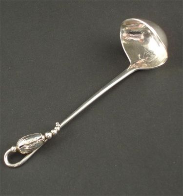 Appraisal: A Georg Jensen silver Blossom pattern cream ladle model no