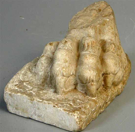 Appraisal: Roman white marble fragment carved as a lion's paw PROVENANCE