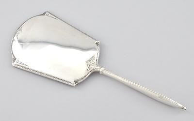 Appraisal: A Sterling Silver Hand Mirror Measuring approx L the beveled