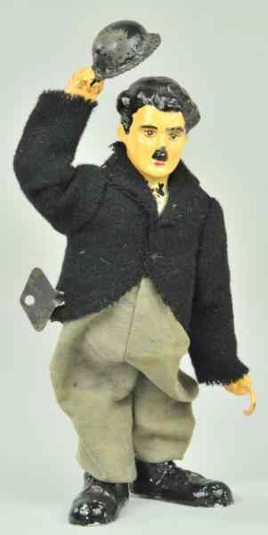 Appraisal: CHARLIE CHAPLIN WALKER Scarce example clockwork activated hand painted tin