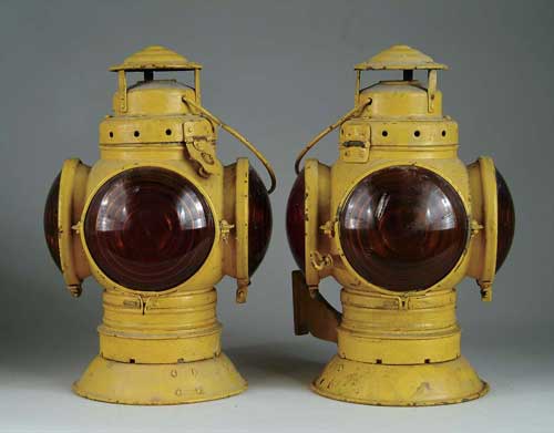 Appraisal: PAIR OF LARGE RAILROAD SIGNAL LANTERNS Painted yellow with red