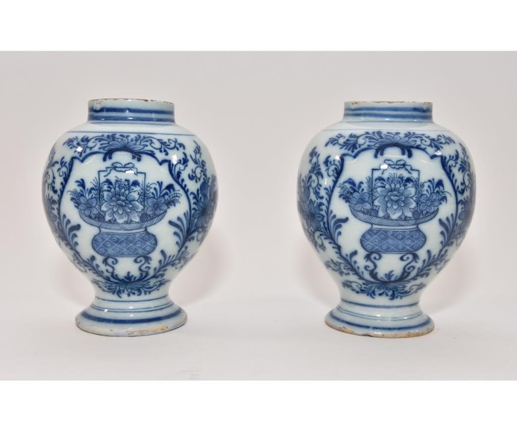 Appraisal: Pair of Makkum delft vases th c each decorated with