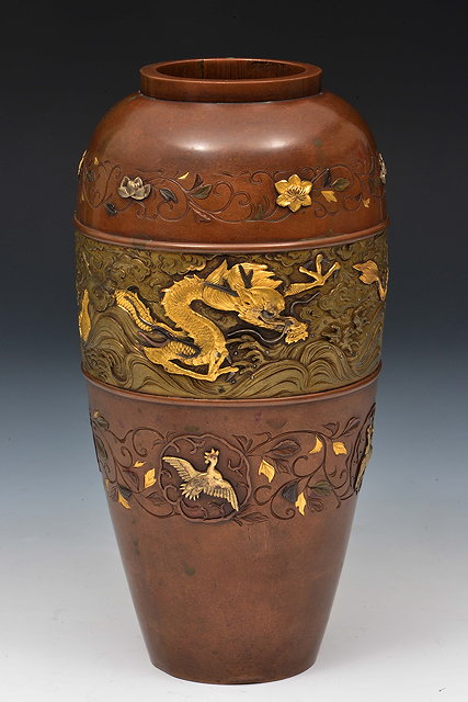 Appraisal: A Japanese bronze vaseMeiji periodHattori workshop carved chased and inlaid