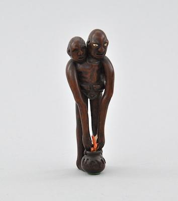 Appraisal: Netsuke of Two Figures with Extended Limbs Carved wood depicting