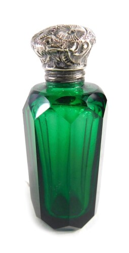 Appraisal: A late thC green glass scent bottle with floral lid