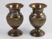 Appraisal: A pair of late Victorian silver vases London Ht cm