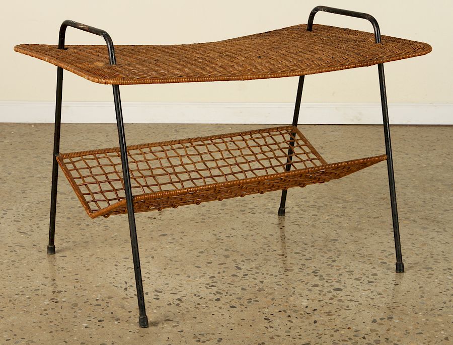 Appraisal: ITALIAN IRON RATTAN COFFEE TABLE CIRCA An Italian iron and