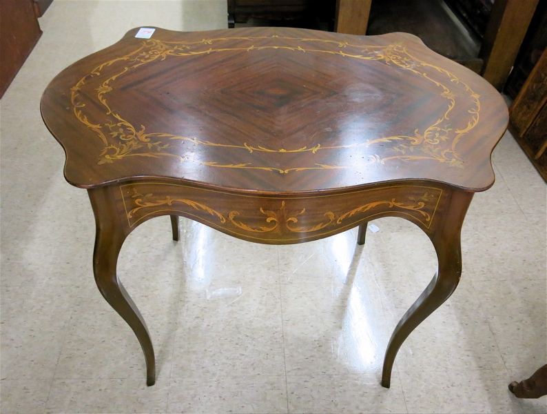 Appraisal: LOUIS XV STYLE INLAID MAHOGANY LAMP TABLE American c having