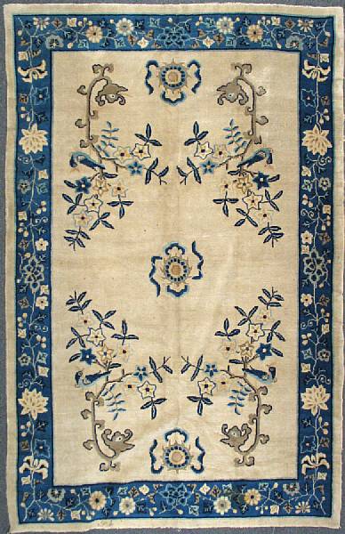 Appraisal: A Chinese carpet size approximately ft in x ft in