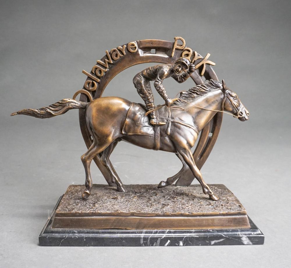 Appraisal: DELAWARE PARK' PATINATED METAL FIGURE OF HORSE AND JOCKEY X