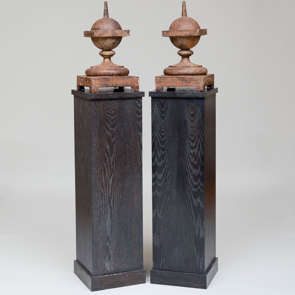 Appraisal: Pair of Painted Iron Finials on Cerused Oak Pedestals The