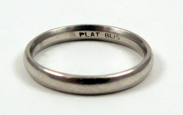 Appraisal: LADY'S PLATINUM BAND weighing grams Ring size -