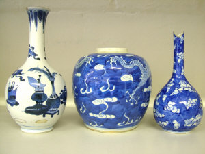 Appraisal: A Chinese blue and white jar decorated with two fighting