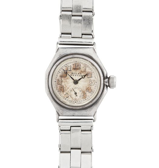 Appraisal: ROLEX - A lady's silver cased wrist watch Oyster model