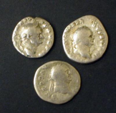 Appraisal: THREE VESPASIAN DENARII with Pax Sacrifical Implements and Vespasian seated