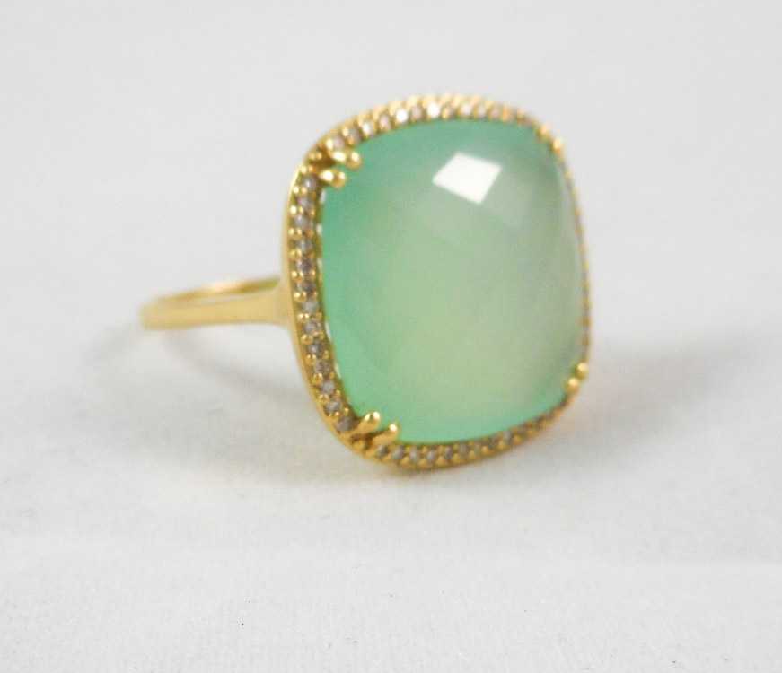 Appraisal: CHALCEDONY DIAMOND AND FOURTEEN KARAT GOLD RING with round-cut diamonds