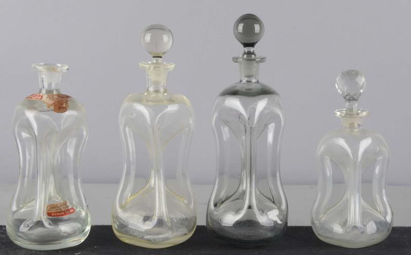 Appraisal: Lot of Glass Decanters Four glass decanters of similar style