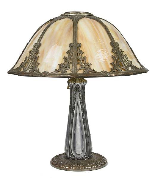 Appraisal: An American silvered metal and slag glass table lamp early