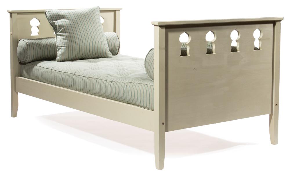 Appraisal: Contemporary Painted Daybed with reticulated keyhole arches mattress and bolsters