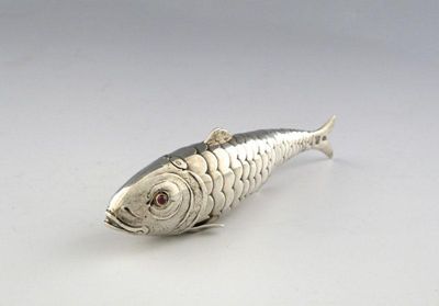 Appraisal: A late-Victorian silver reticulated fish spice box the hinged head