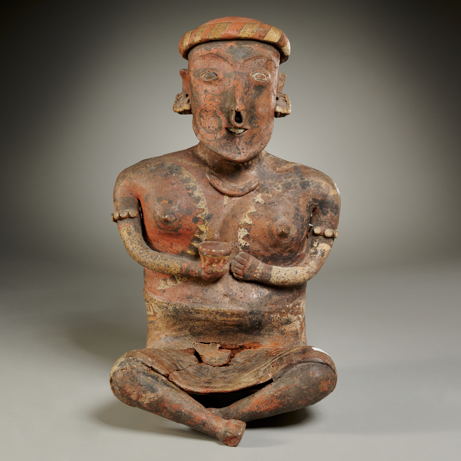 Appraisal: NAYARIT POTTERY FIGURE OF A WOMAN EX-PARKE-BERNET possibly BCE- CE